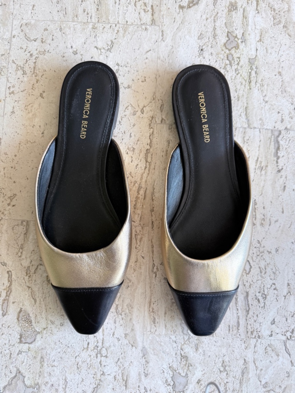 Veronica Beard black and gold leather flat.